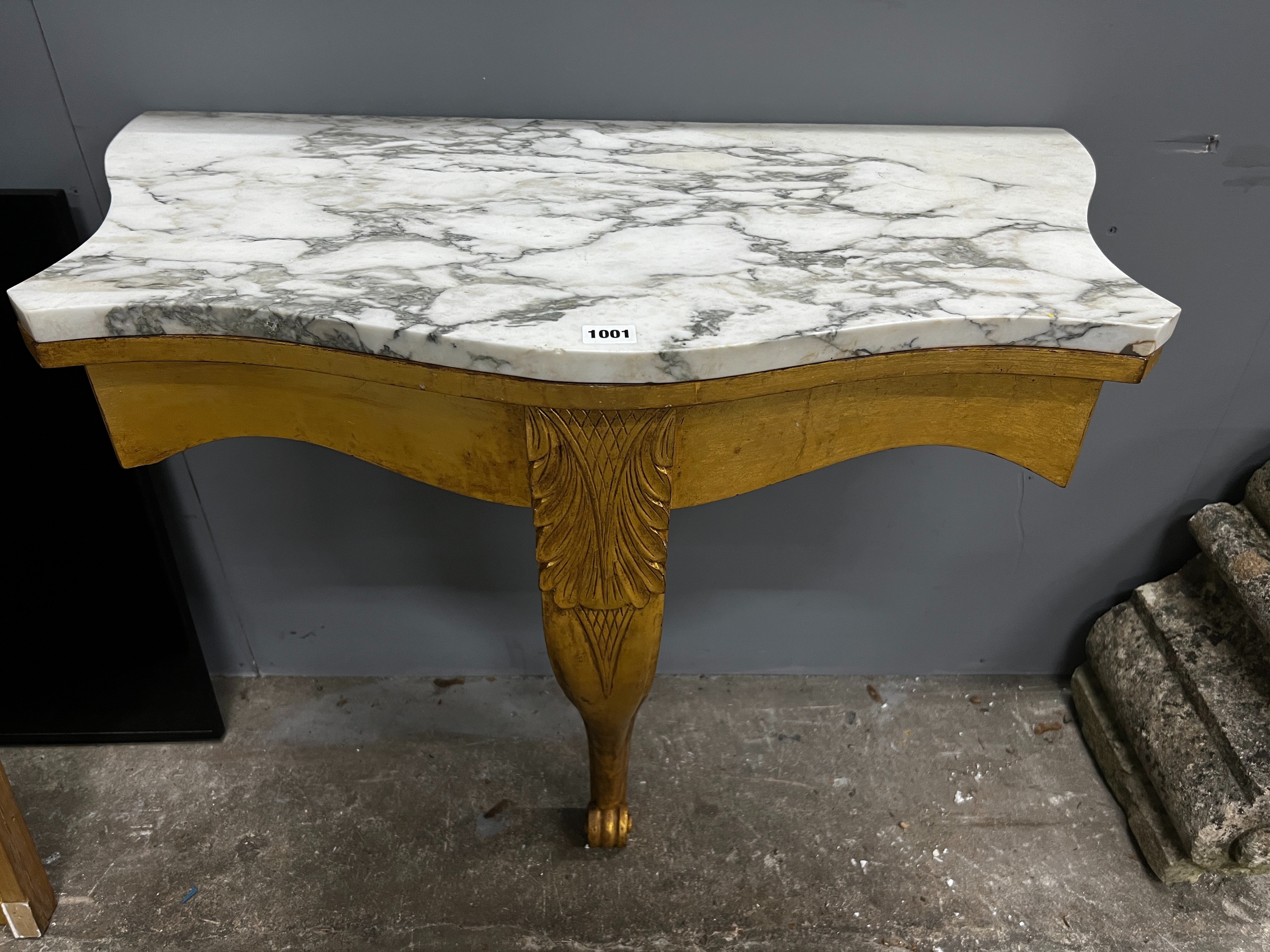 A Victorian style carved giltwood marble topped serpentine console table, width 84cm, depth 44cm, height 79cm